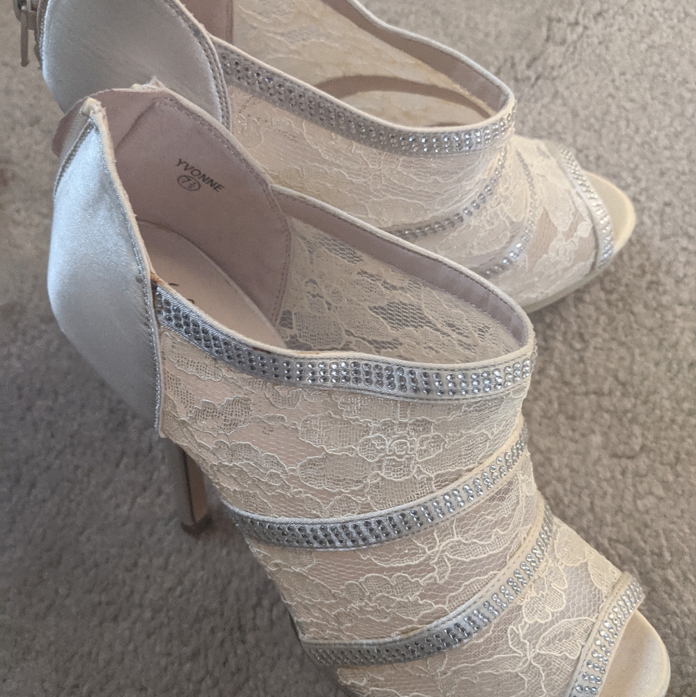 Lace and embellished shoe
